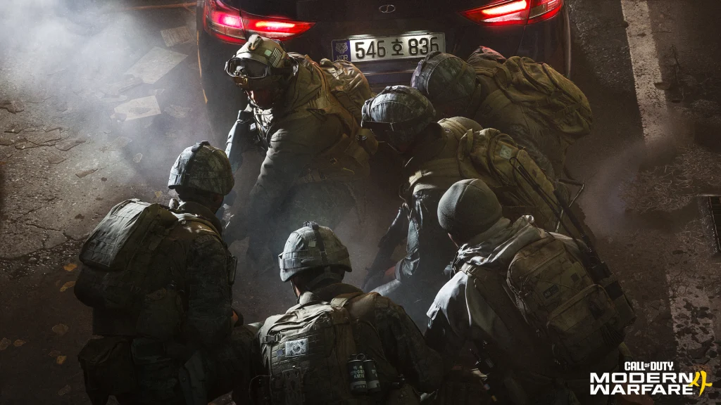 Escouade à couvert derrière une voiture immatriculée en Corée du Sud dans Modern Warfare 4