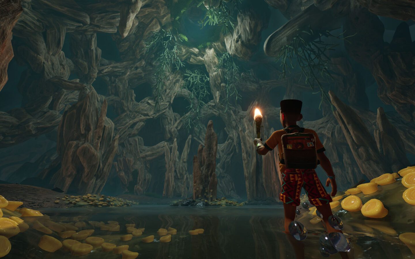 Capture officielle de Grounded 2 Rot and Ruin : un personnage explore une caverne du Woodpile à la torche